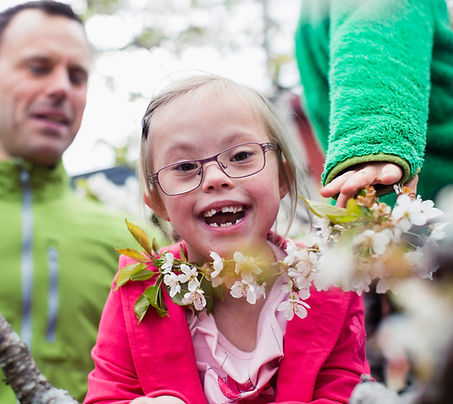 Smiling girl with flowers