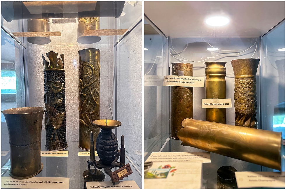 Display of intricately engraved brass artillery shells in a glass case, with labels in a museum setting, creates a historical mood. artillery shells in Fort Kluže, Slovenia