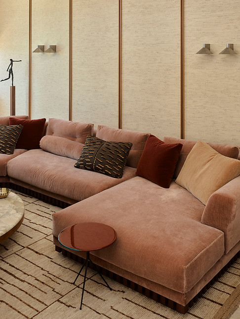 confortable lounge with rattan wallpaper panels behind sydney interior design the carlisle tamarama