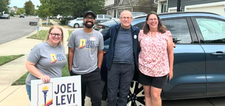 Joel Levi with his campaign manager, Tricia and volunteers.