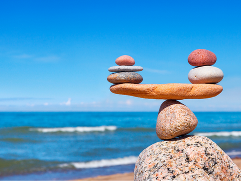 Rocks balanced by the ocean.