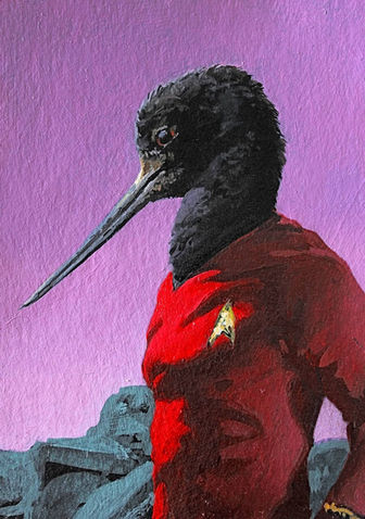 Star Trek bird-like alien in red uniform