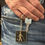 Thumbnail: The front says in raised letters, V I P vertically in front of stickman with cane.
