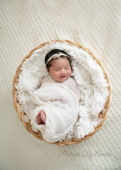 Newborn-girl-in-basket
