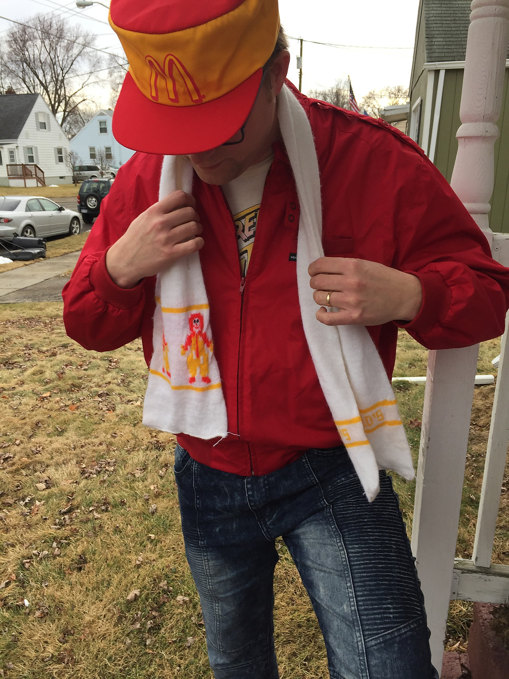 Man outdoors wearing a Member's Only jacket.