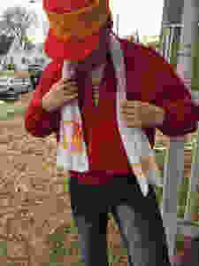 Man outdoors wearing a Member's Only jacket.