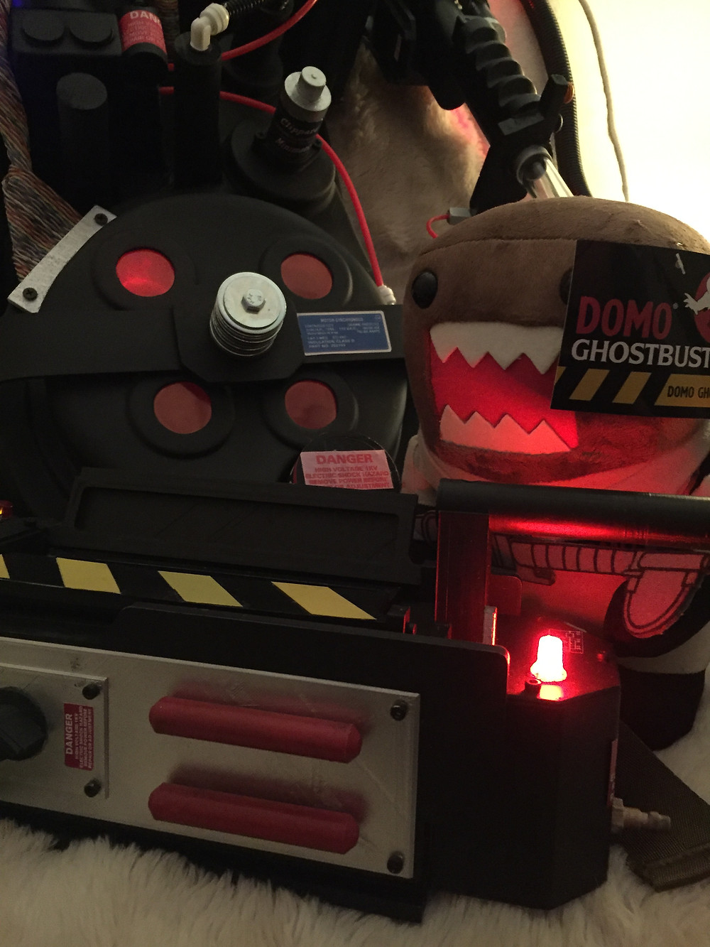 Ghostbusters Domo plushie toy with ghost trap and proton pack.