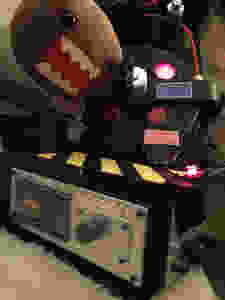 Ghostbusters proton pack and ghost trap with Ghostbuster Domo plush.