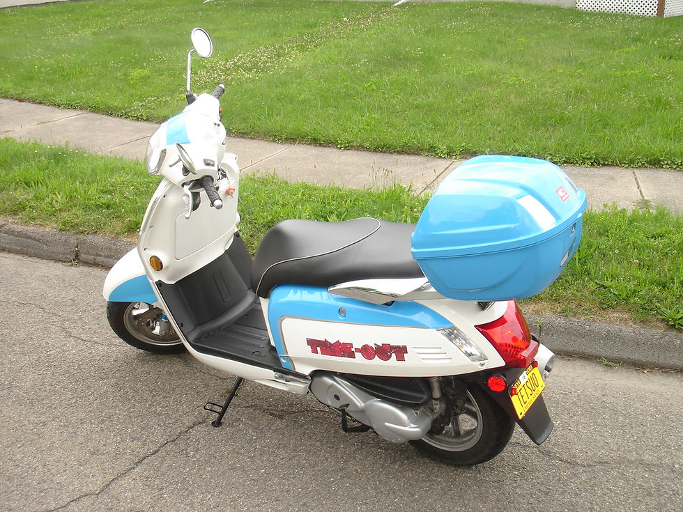 2014 Kymco Like 200i LX with Time-Out and Akira decals.