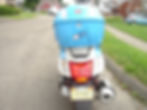 Scooter with Tetsuo Akira anime custom license plate.