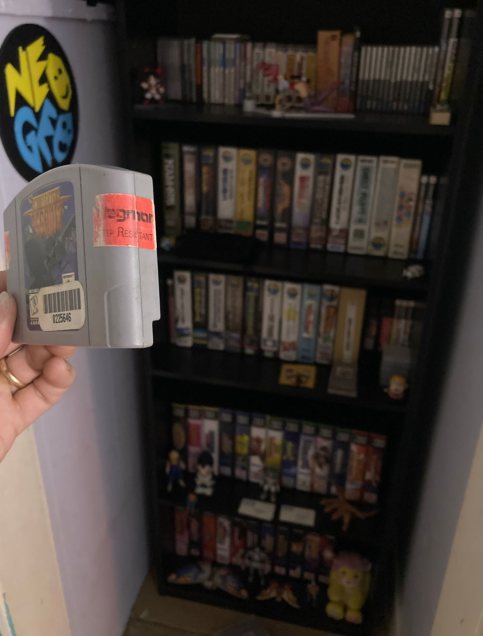 Nintendo 64 Aerofighters Assault cartridge with Neo-Geo games in background