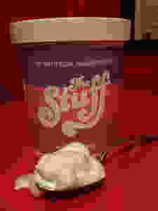 Replica container of The Stuff horror film with spoon.