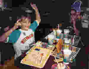 '80s McDonald's birthday party with Ronald and Grimace birthday cake.
