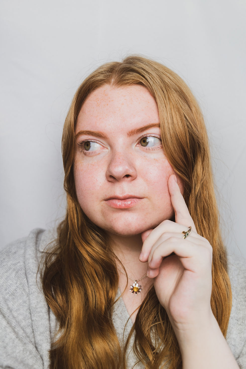 self portrait inspired by murder mystery books and games, wearing a grey jumper