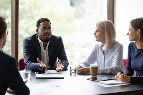 Business team meeting: Man presenting ideas