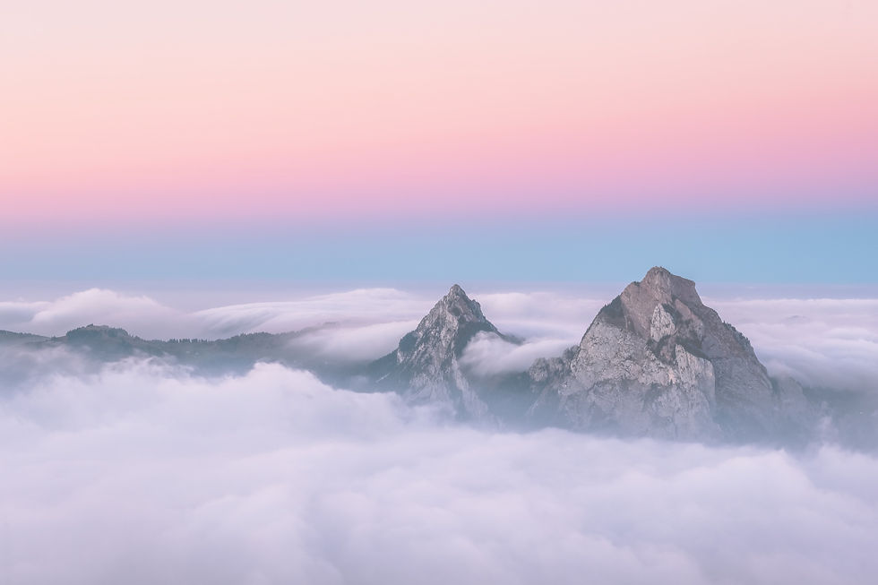 beautiful-aerial-shot-fronalpstock-mountains-switzerland-beautiful-pink-blue-sky_edited.jp