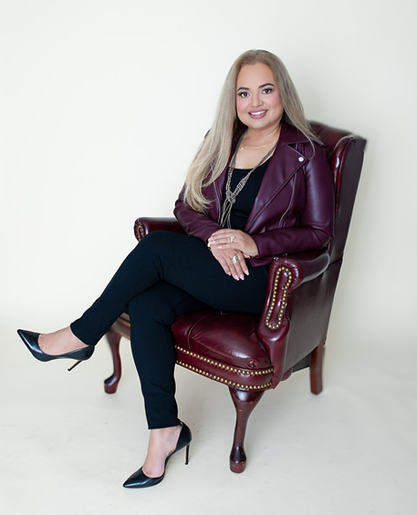Claudia-sitting in chair.jpg