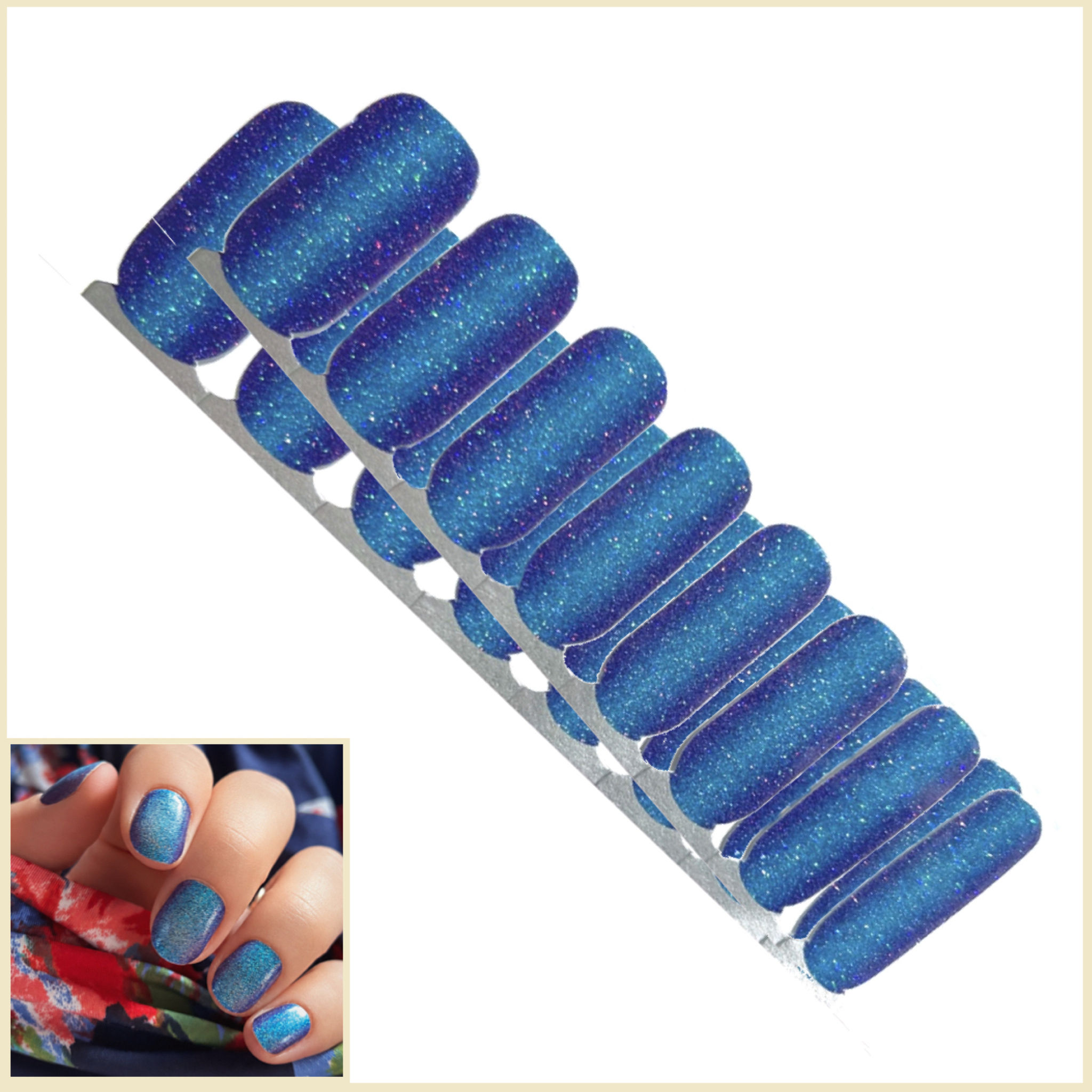 Sparkly blue set of nail wraps that are darker on the sides and lighten towards the center into teal