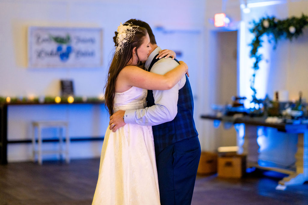 Bride and groom embracing during their private last dance