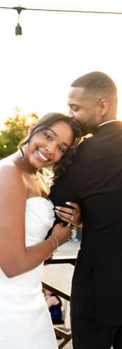 Bride laying her head on Grooms shoulder while on top of balcony at Wanderlust Okto in Orlando, Florida.