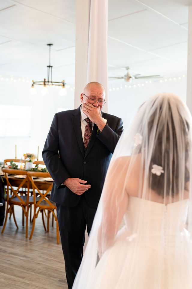 Bride approaching her father for their first look