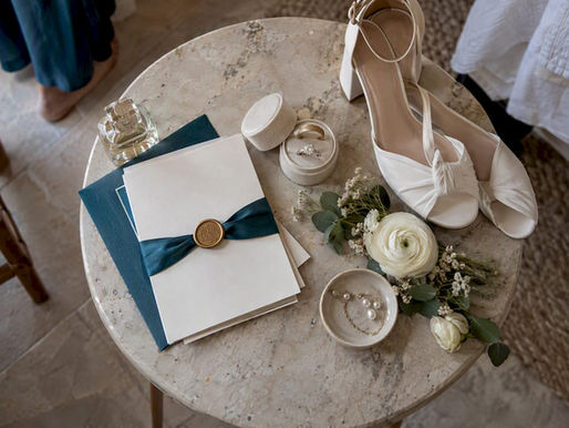 Wedding invitation suite with rings and flowers