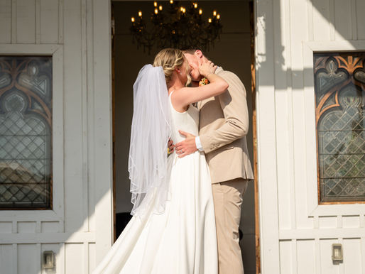 Bride and Groom Kissing in front of Ever After Farms Wedding Chapel | Pixel Groves Wedding Photography + Videography
