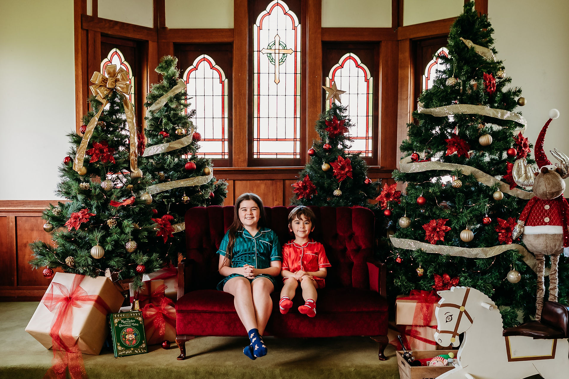 Family portrait against the historic church backdrop, Forth