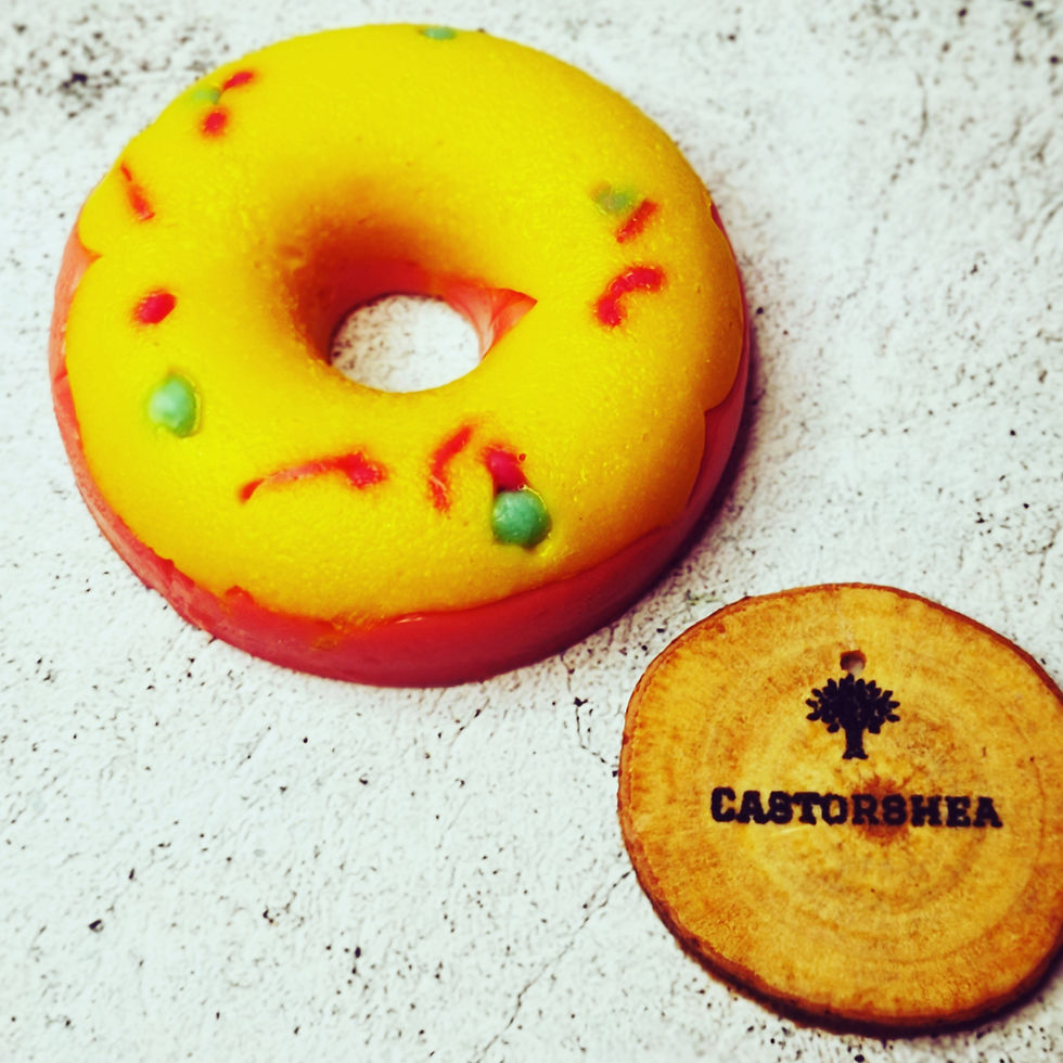 doughnut shaped soap yellow and pink