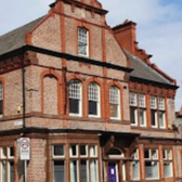 Historic building, Street sign, brickwork. 20mph zone, Warrington. The Dog Friendly Map.