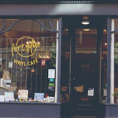 Exterior shot of a business with the words "fortyfive VINYL CAFE" visible.