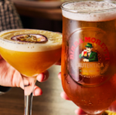 Passionfruit cocktail and Birra Moretti beer being served in glasses