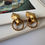 Thumbnail: Matt 80s panther vintage clip-on earrings with hoops