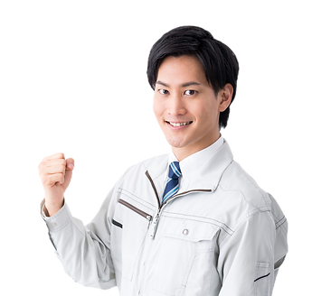 ガッツポーズの作業服の男性