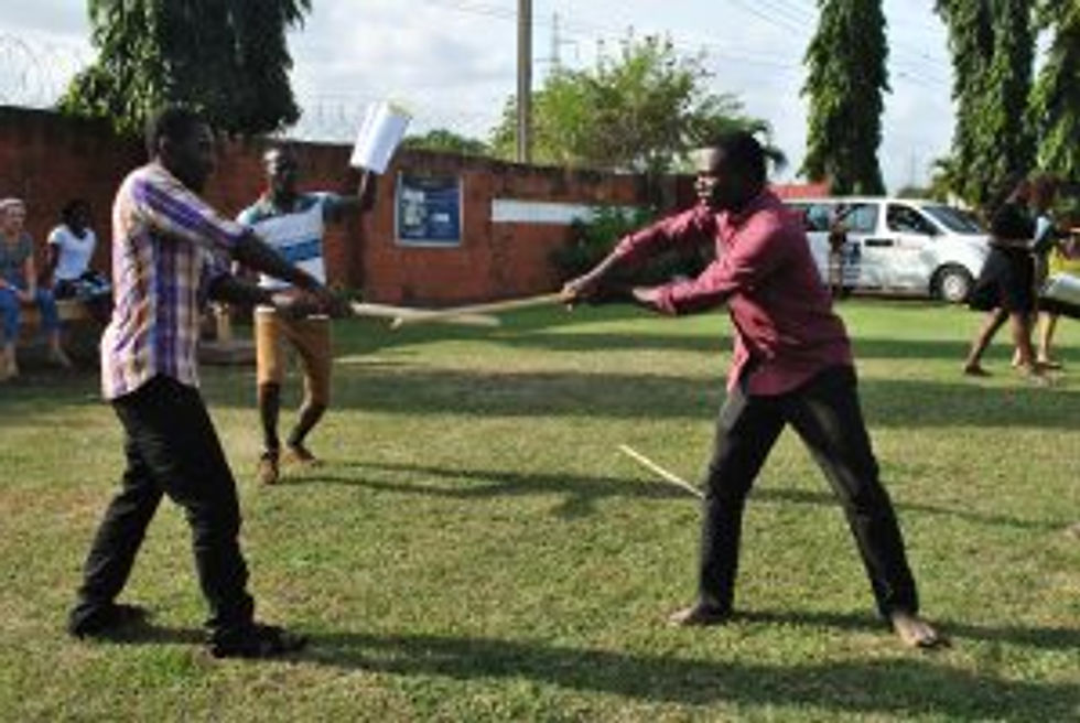 Antipholus of Ephesus battles the Merchant in Comedy of Errors (Summer Shakespeare 2012)