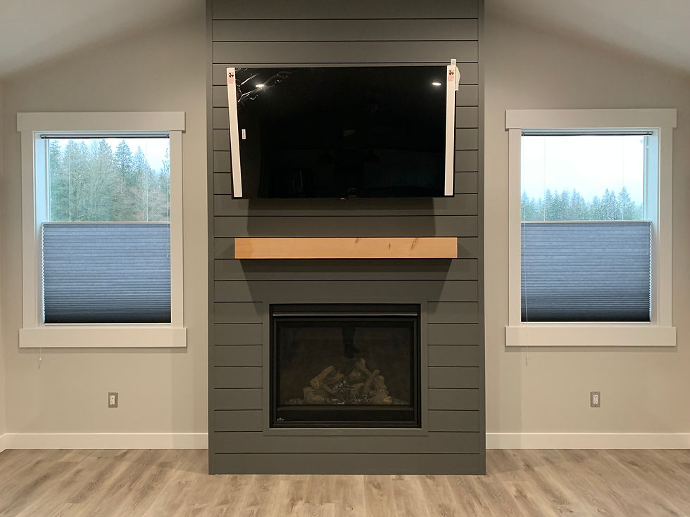 Cellular Shades on either side of a Fireplace