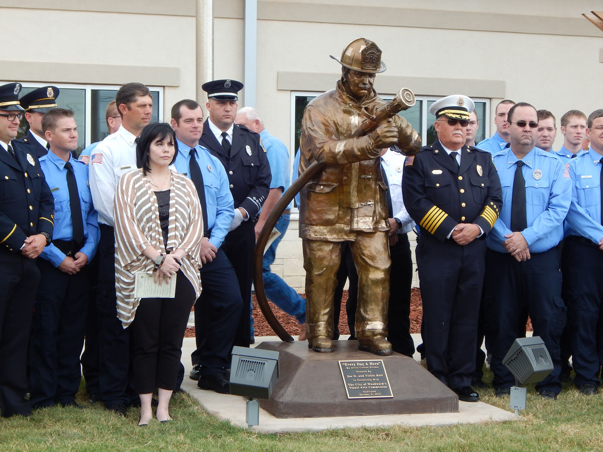 Installation of the "Every Day a Hero" bronze firefighter sculpture in Woodward, Oklahoma