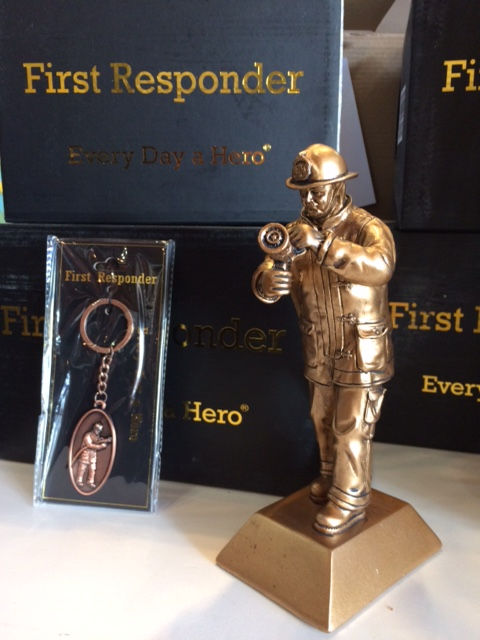 Collectible eight inch "Every Day a Hero" firefighter sculpture by Colette Pitcher