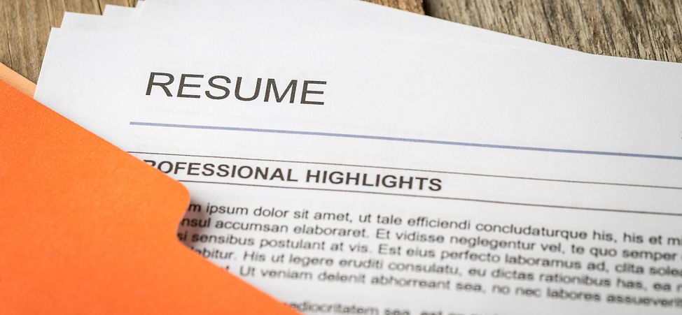 Stack of resumes in an orange file folder