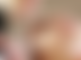 A close-up of a woman receiving a professional facial treatment, with a creamy mask being applied to her skin using a brush – Clarity Skin logo in the corner.