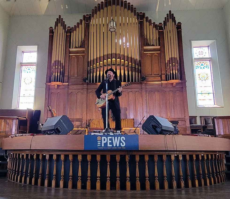 Colin Linden in a recent performance. Much of the building is the same as it always was, with the original organ pipes, stained-glass windows and the altar rail, lovingly kept and protected under the semi-circular wooden stage.