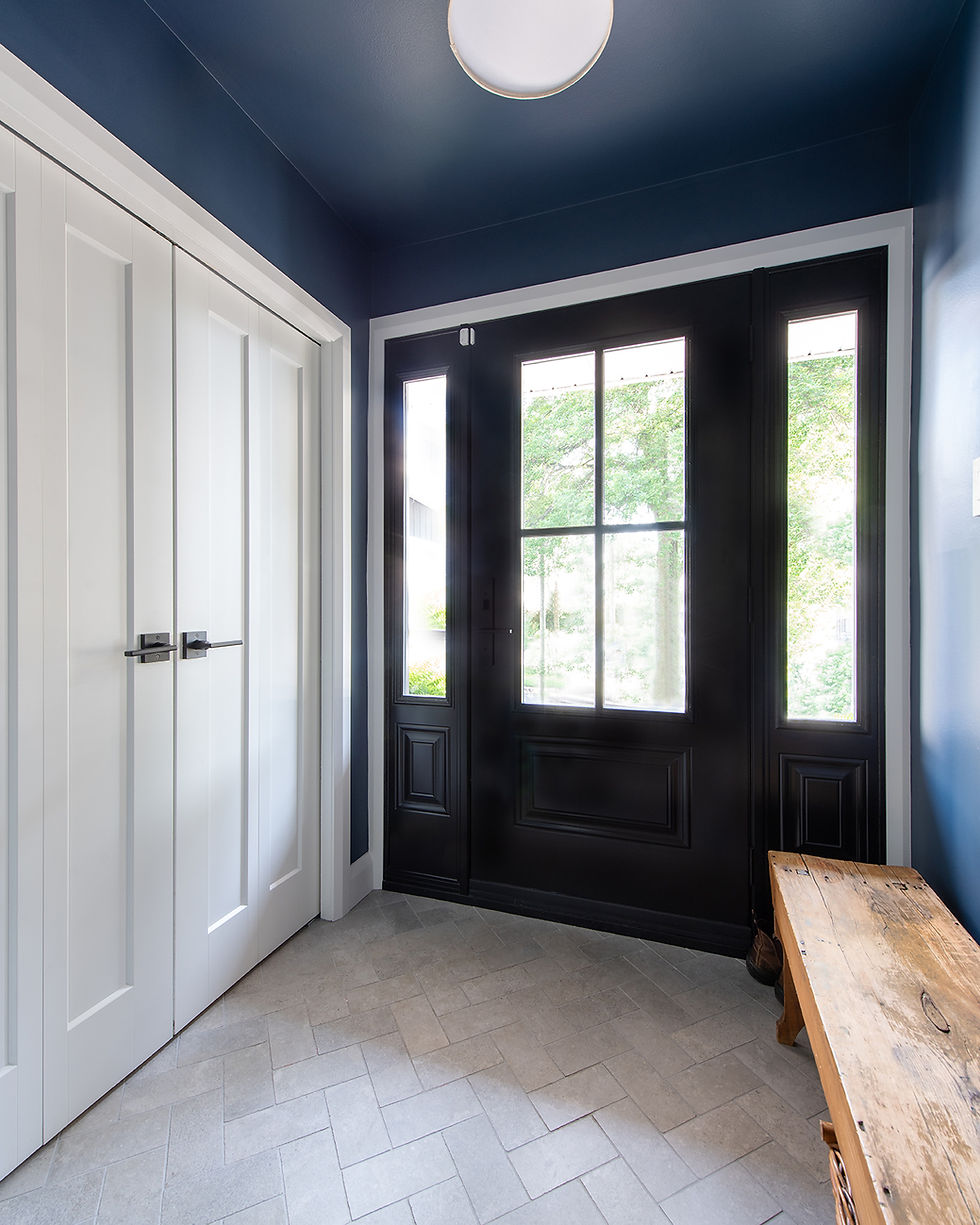 Front entrances such as this space designed by Lagois, can be every bit as functional for a busy family as a mud room, and elegant, too.