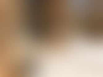 Sap collecting pails on trees in snowy Ontario woods in spring