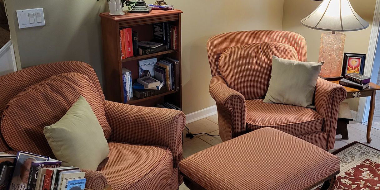 A small library area with spiritual books at Our Lady of Fatima Guest House.