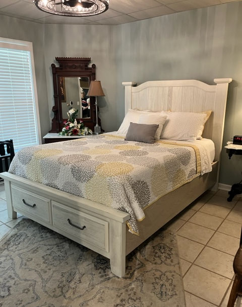 Master bedroom with queen bed at Our Lady of Fatima Guest House