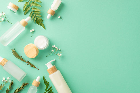 Organic cosmetics products concept. High angle view photo of cosmetic jars and bottles wit