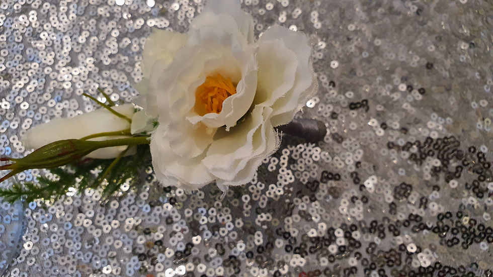 Thumbnail: Bride bouquet and Groom's button hole