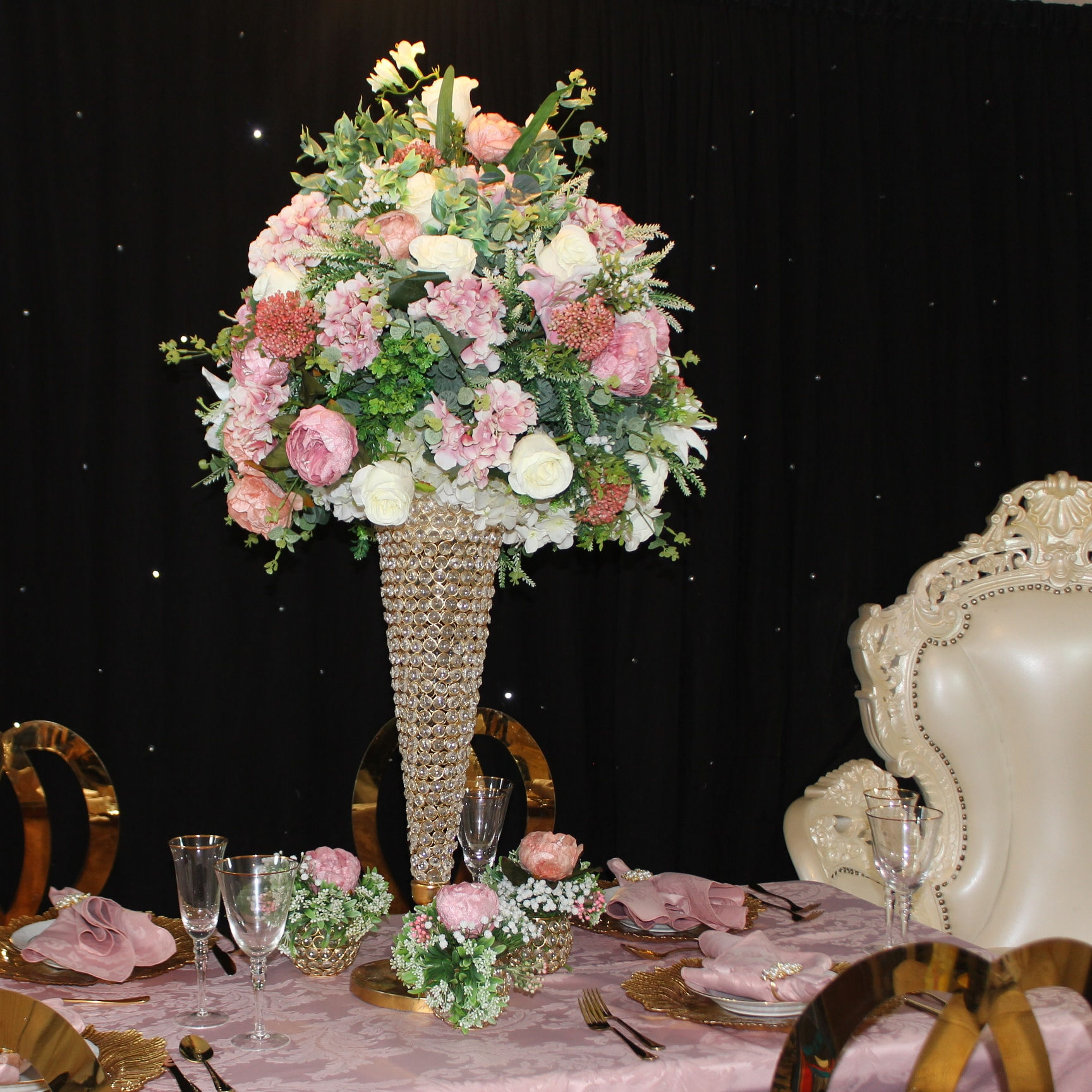 Beaded conical vase floral centrepiece for hire