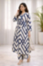Woman wearing a white and blue geometric Women Printed Kurta Plazo (Pant) Set