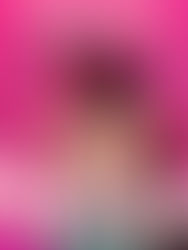 a famished man standing in front of a pink background